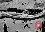 Image of Vietnamese children run to see event Vietnam, 1954, second 40 stock footage video 65675044095