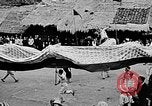 Image of Vietnamese children run to see event Vietnam, 1954, second 42 stock footage video 65675044095