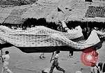 Image of Vietnamese children run to see event Vietnam, 1954, second 43 stock footage video 65675044095