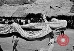 Image of Vietnamese children run to see event Vietnam, 1954, second 44 stock footage video 65675044095