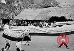 Image of Vietnamese children run to see event Vietnam, 1954, second 46 stock footage video 65675044095