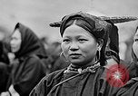 Image of Vietnamese children run to see event Vietnam, 1954, second 50 stock footage video 65675044095
