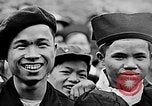 Image of Vietnamese children run to see event Vietnam, 1954, second 51 stock footage video 65675044095