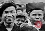 Image of Vietnamese children run to see event Vietnam, 1954, second 52 stock footage video 65675044095