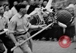 Image of Vietnamese children run to see event Vietnam, 1954, second 58 stock footage video 65675044095