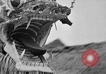 Image of Vietnamese children run to see event Vietnam, 1954, second 59 stock footage video 65675044095