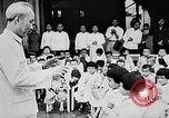 Image of Ho Chi Minh speaking in various venues Vietnam, 1960, second 8 stock footage video 65675044106