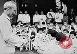 Image of Ho Chi Minh speaking in various venues Vietnam, 1960, second 9 stock footage video 65675044106