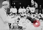 Image of Ho Chi Minh speaking in various venues Vietnam, 1960, second 10 stock footage video 65675044106