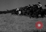 Image of girls train as calvary Culver City California USA, 1934, second 17 stock footage video 65675044117