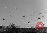 Image of French paratroops jump South East Asia, 1952, second 36 stock footage video 65675044126