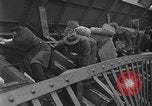 Image of Crossing destroyed Tangermunde bridge Germany, 1945, second 47 stock footage video 65675044139