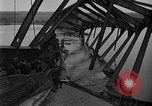 Image of Crossing destroyed Tangermunde bridge Germany, 1945, second 59 stock footage video 65675044139