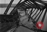 Image of Crossing destroyed Tangermunde bridge Germany, 1945, second 61 stock footage video 65675044139