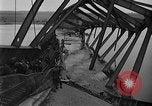 Image of Crossing destroyed Tangermunde bridge Germany, 1945, second 62 stock footage video 65675044139