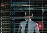Standbild NORAD Raketenabwehrsimulation im Kalten Krieg United States USA, 1962, aus Sekunde 36 historischem Filmmaterial Videoclip 65675044166