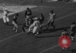 Image of Football match Miami Florida USA, 1940, second 41 stock footage video 65675044326
