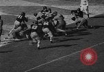 Image of Football match Miami Florida USA, 1940, second 44 stock footage video 65675044326