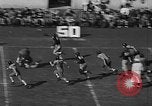 Image of Football match Miami Florida USA, 1940, second 56 stock footage video 65675044326