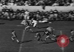 Image of Football match Miami Florida USA, 1940, second 57 stock footage video 65675044326