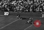 Image of Football match Miami Florida USA, 1940, second 60 stock footage video 65675044326