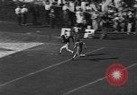 Image of Football match Miami Florida USA, 1940, second 62 stock footage video 65675044326