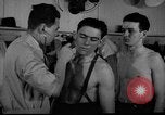 Standbild US Army recruitment Center Zweiten Weltkrieg New York United States USA, 1940, aus Sekunde 13 historischem Filmmaterial Videoclip 65675044344