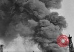 Image of blast in oil refinery Long Beach California USA, 1933, second 11 stock footage video 65675044362