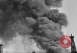 Image of blast in oil refinery Long Beach California USA, 1933, second 12 stock footage video 65675044362