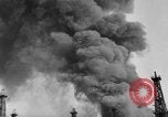 Image of blast in oil refinery Long Beach California USA, 1933, second 13 stock footage video 65675044362