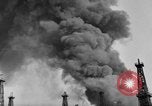 Image of blast in oil refinery Long Beach California USA, 1933, second 14 stock footage video 65675044362