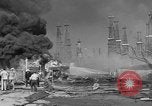 Image of blast in oil refinery Long Beach California USA, 1933, second 33 stock footage video 65675044362
