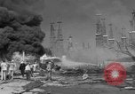 Image of blast in oil refinery Long Beach California USA, 1933, second 34 stock footage video 65675044362