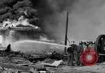 Image of blast in oil refinery Long Beach California USA, 1933, second 37 stock footage video 65675044362