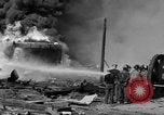 Image of blast in oil refinery Long Beach California USA, 1933, second 39 stock footage video 65675044362