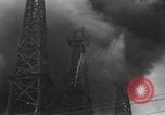 Image of blast in oil refinery Long Beach California USA, 1933, second 42 stock footage video 65675044362