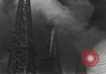 Image of blast in oil refinery Long Beach California USA, 1933, second 44 stock footage video 65675044362