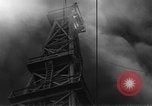 Image of blast in oil refinery Long Beach California USA, 1933, second 51 stock footage video 65675044362