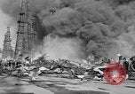 Image of blast in oil refinery Long Beach California USA, 1933, second 53 stock footage video 65675044362