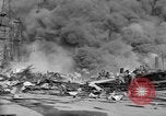 Image of blast in oil refinery Long Beach California USA, 1933, second 56 stock footage video 65675044362