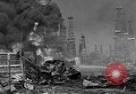 Image of blast in oil refinery Long Beach California USA, 1933, second 58 stock footage video 65675044362