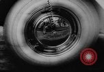 Standbild leuchten Reifen eines Autos Deutschland, 1962, aus Sekunde 25 historischem Filmmaterial Videoclip 65675044376