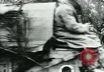 Image of American troops and French tanks in World War I France, 1918, second 3 stock footage video 65675044427