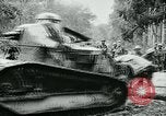 Image of American troops and French tanks in World War I France, 1918, second 32 stock footage video 65675044427