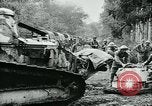 Image of American troops and French tanks in World War I France, 1918, second 33 stock footage video 65675044427