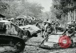 Image of American troops and French tanks in World War I France, 1918, second 34 stock footage video 65675044427