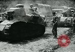 Image of American troops and French tanks in World War I France, 1918, second 39 stock footage video 65675044427