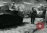 Image of American troops and French tanks in World War I France, 1918, second 41 stock footage video 65675044427