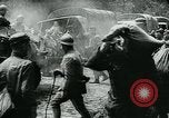 Image of American troops and French tanks in World War I France, 1918, second 44 stock footage video 65675044427