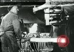 Image of Forging in a steel mill Europe, 1918, second 1 stock footage video 65675044430